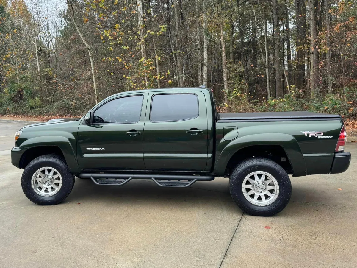 dark green truck with tinted windows