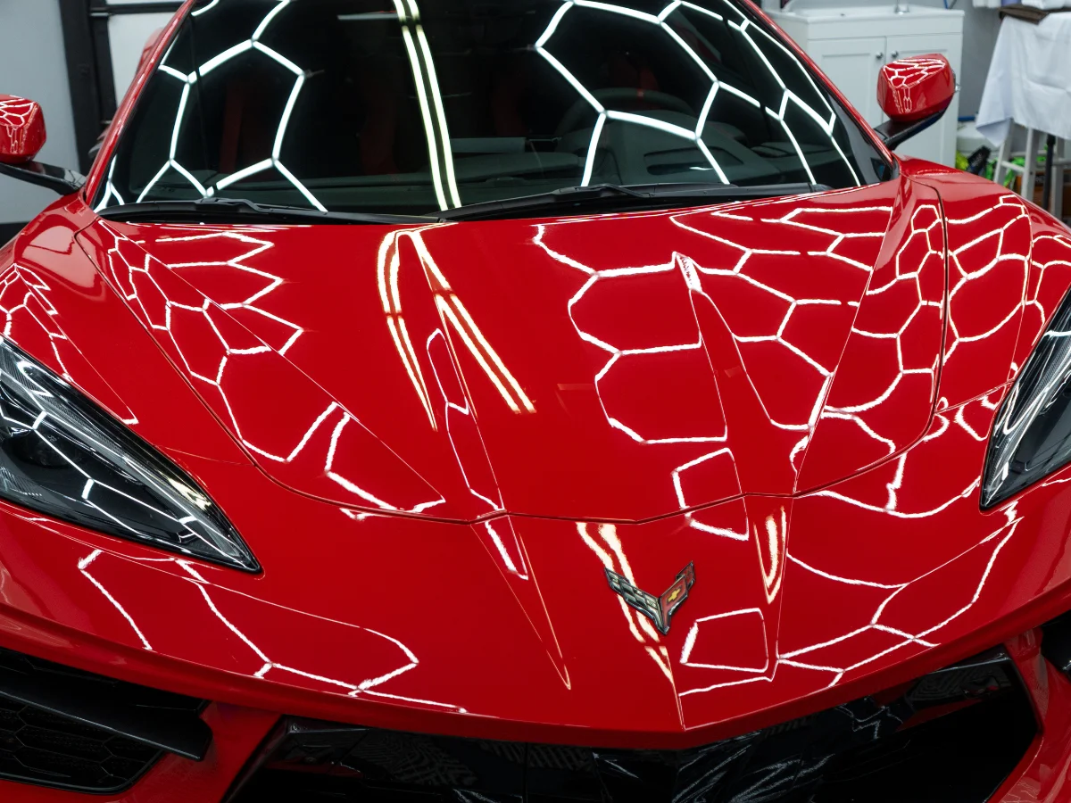 red corvette close shot after ceramic coating application